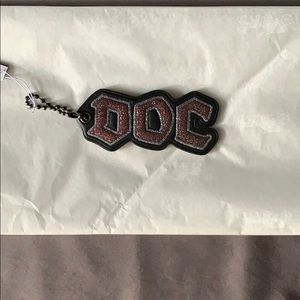 BNWT COACH x DISNEY “DOC” KEY CHAIN